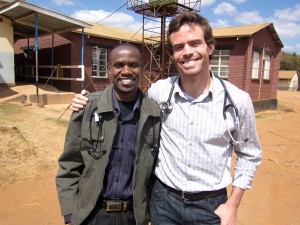 two friends pose in Malawi
