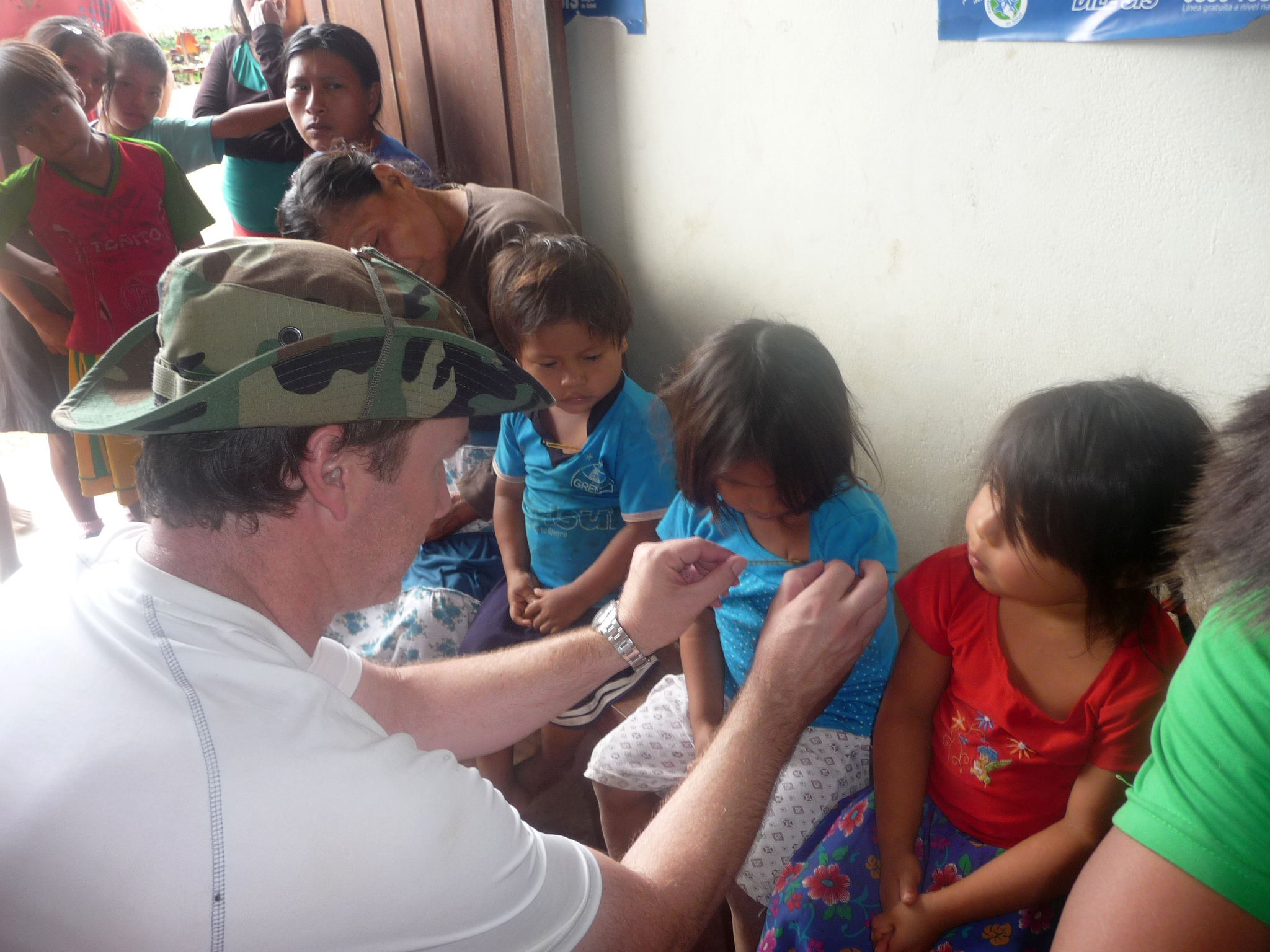 UJMT Trainee Michael Deshotel working with children in Peru